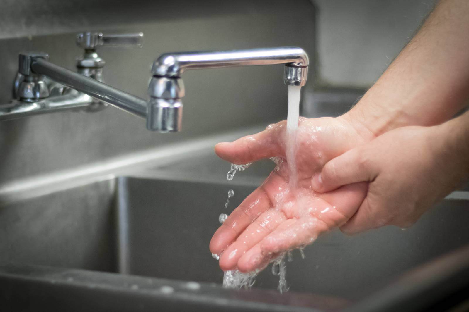 Person practicing good hand hygiene