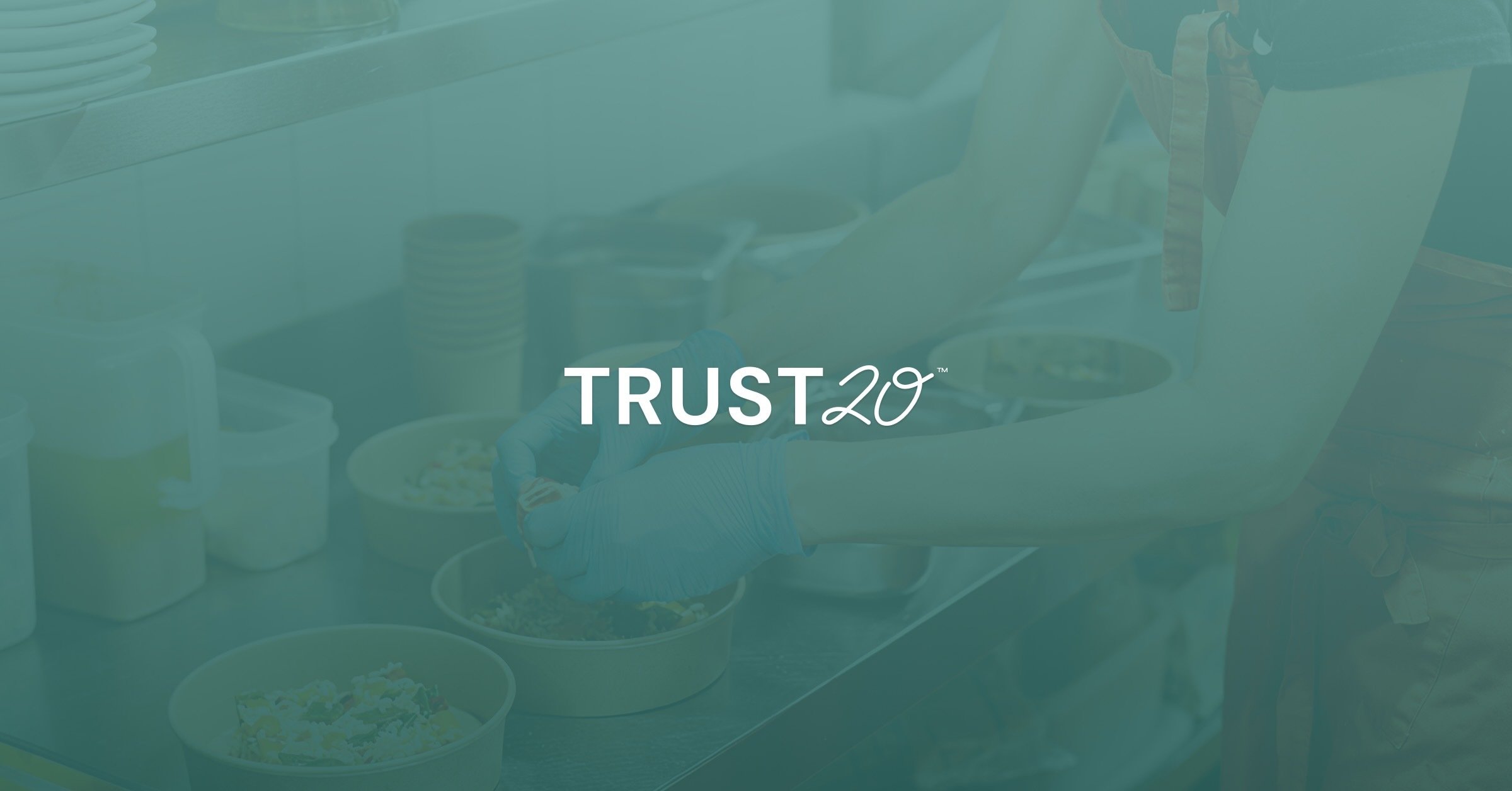 A teal blue transparent background sits over a photo of a food prep space with Trust20 in white letters.